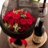 真紅のバラと赤ワインで